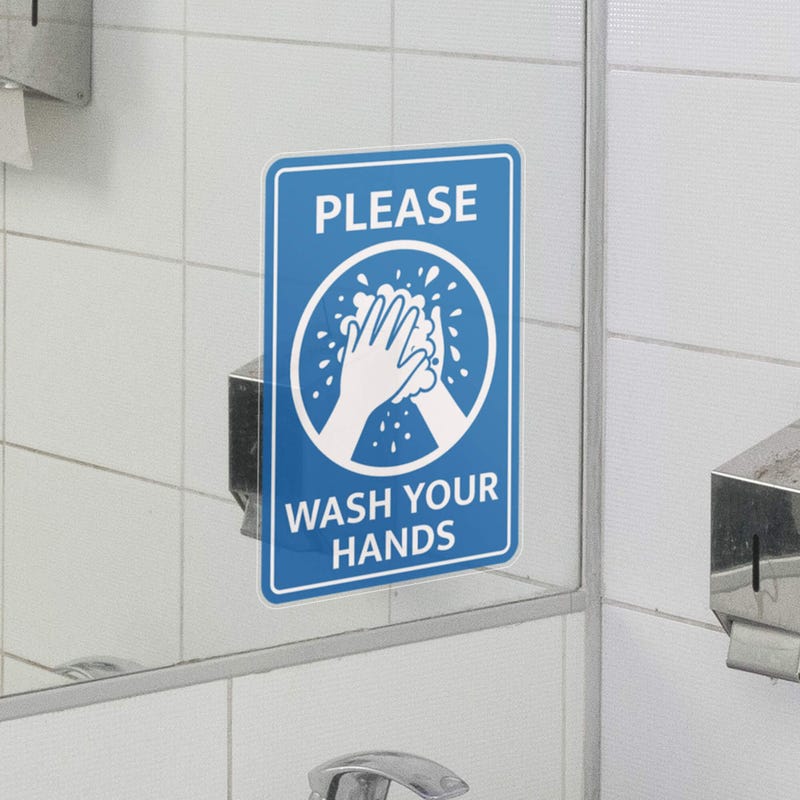 A vertical window cling by a sink for handwashing