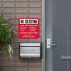 Red No soliciting sign. Do not ring bell or knock. No excuses, No exceptions in white text hung next to front door