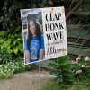 Clap, Honk, Wave Graduation Yard Sign Next to Stairs