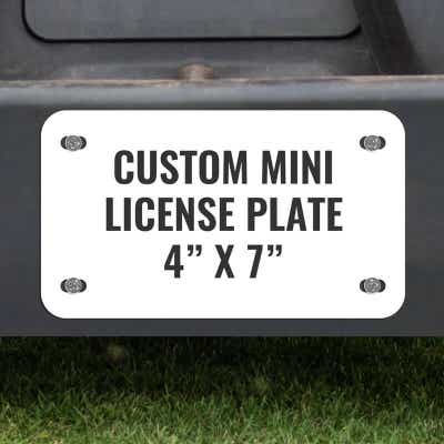 Custom Mini License Plate for Golf Carts 4x7 Shown on a Gold Cart