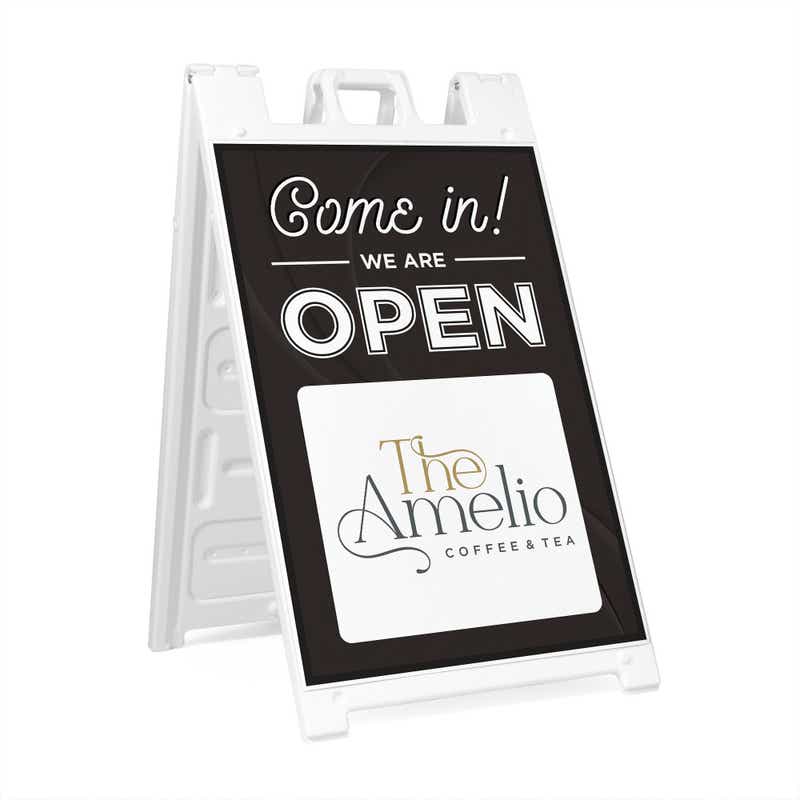 A We Are Open sandwich board sign for a coffee and tea shop
