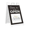 A We Are Open sandwich board sign for a coffee and tea shop