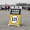A $25 park here sandwich board displayed near a stadium 