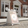 A wedding venue welcome sandwich board sign displayed outside