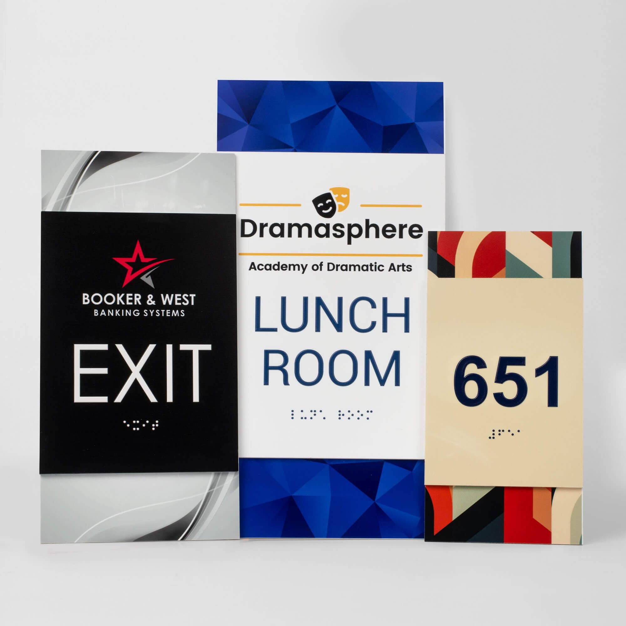 Three different sizes and designs of the vertical 2-layered ADA sign