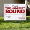 University logo graduation yard sign displayed in a front yard