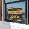 Gold Stars Graduation Yard Sign displayed in a window