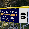 Custom Logo We're Hiring Vinyl Banner In Blue - 3x6 Lifestyle