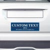 Custom Text Political Bumper Sticker on the bumper of a white car
