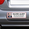 Silver Alert Political Bumper Sticker on the bumper of a gray car