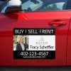Custom real estate agent car magnet sign on red car door