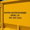 A constructions company's information stenciled onto a container