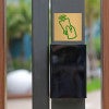 2x2 printed brass sign displayed on a pole