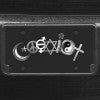 A close up of the Coexist front license plate on a black car