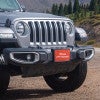 I Brake For Critters front license plate on a Jeep