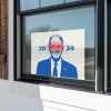 Dark Brandon Yard Sign in a Window