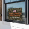 Camo MAGA Trump Yard Sign in a Window