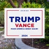 Trump Vance White Yard Sign next to pavement