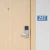 Blue 2 by 4 Plastic Sign Showing Room Number