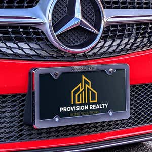 Upload Your Logo Custom Front License Plate on Red Car at an Angle