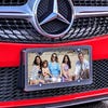 Upload Your Family Photo Custom Front License Plate on Red Car Angled Lifestyle Image