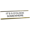 White desk plate with black custom text in a yellow gold holder