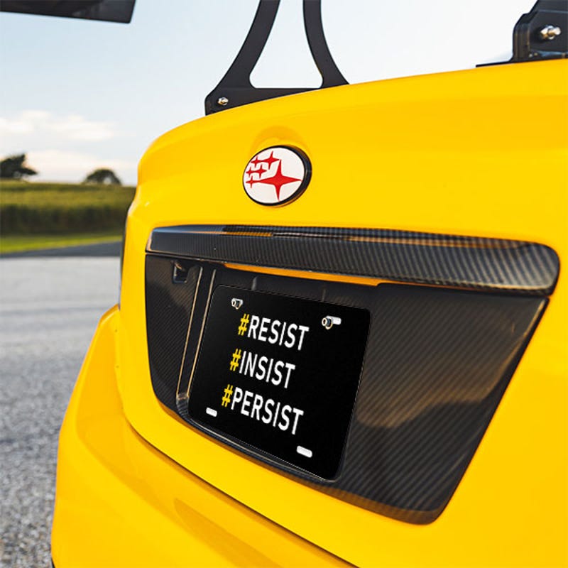 Front License Plate On Yellow Car