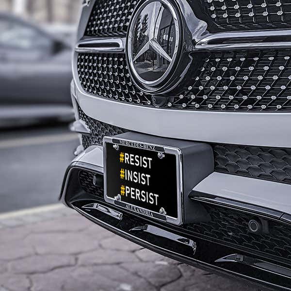 Front License Plate On Black Car