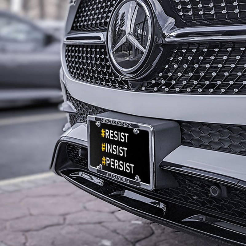 Front License Plate On Black Car