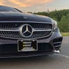 Front License Plate On Black Car