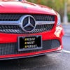 Front License Plate On Red Car
