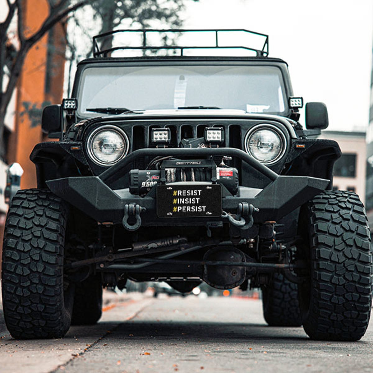 Front License Plate On Black Car