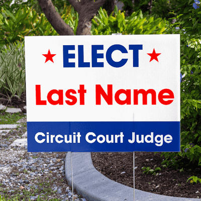 Basic Election Yard Sign Next to Pavement