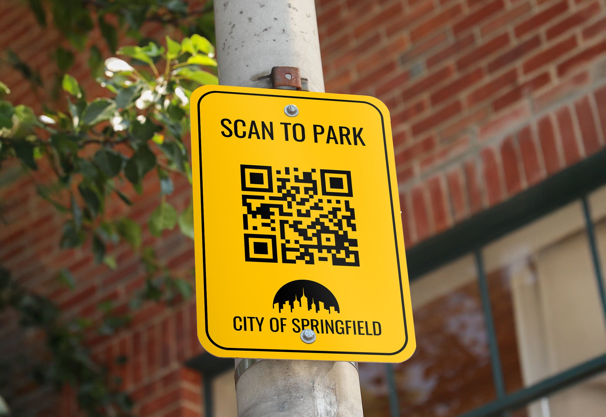 An outdoor aluminum sign with a QR code for a scan-to-park parking lot